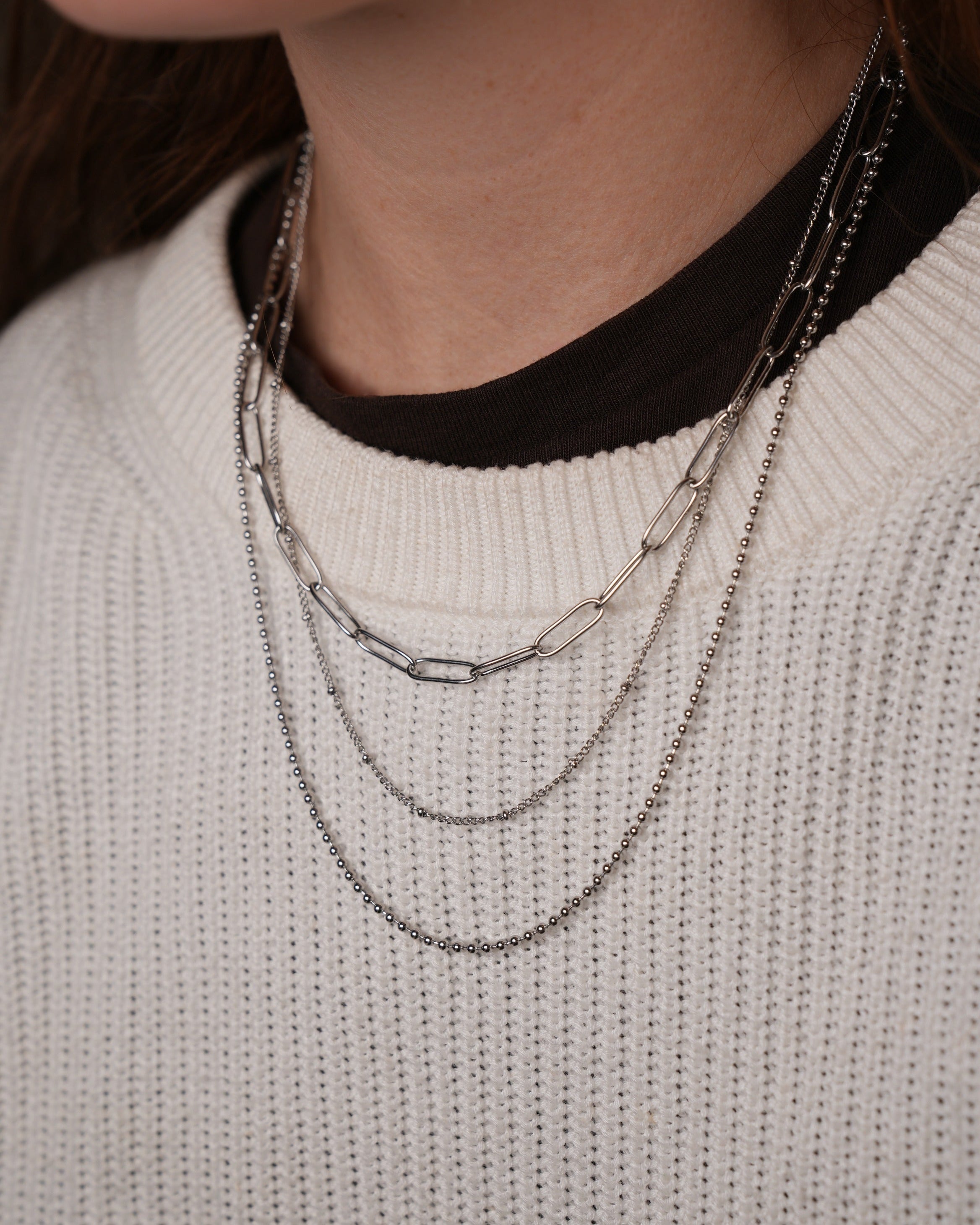 3 laagse ketting in het zilverkleurig met schakel